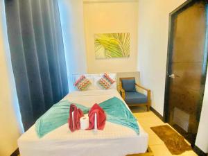 Postel nebo postele na pokoji v ubytování Mactan Newtow Enjoy Family Staycation + 37 fotografií