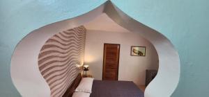 Rúm í herbergi á Sunrise Club Hotel