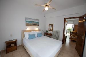 Postel nebo postele na pokoji v ubytování Lilian Beachfront Apartments