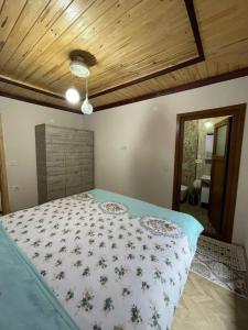 מיטה או מיטות בחדר ב-Özgür Apart