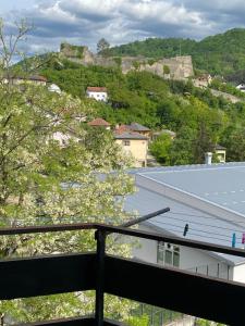 a view from the balcony of a building at Vista Castle in Jajce