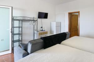 Posteľ alebo postele v izbe v ubytovaní Finca La Calera Lanzarote