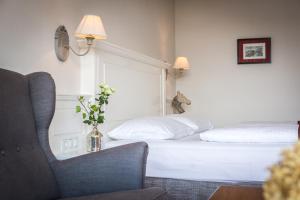 Letto o letti in una camera di Boutique-Hotel Alter Gerichtshof