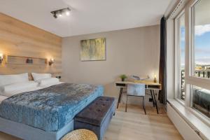 En eller flere senger på et rom på Exclusive sea-side apartment at Tjuvholmen - Oslo!