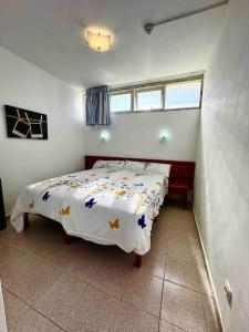 Кровать или кровати в номере Lovelly Bungalow +14 фотографий