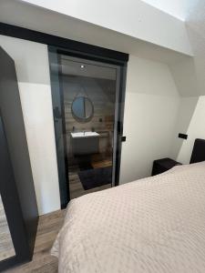 Posteľ alebo postele v izbe v ubytovaní Het Eiland