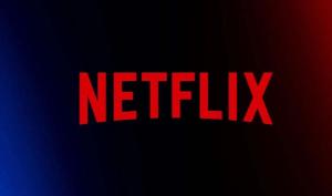 een rood netflix-logo op een zwarte achtergrond bij Gîte Les Acacias in Colmar