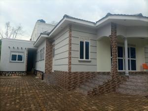 una rappresentazione di una casa con vialetto di mattoni di Pearl Furnished Rooms Buloba a Kampala