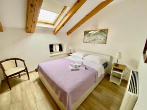 Postel nebo postele na pokoji v ubytování Bed and Breakfast Palac