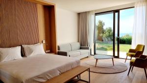 Postel nebo postele na pokoji v ubytování Sól by Privé - Boutique Hotel - Kepi i Rodonit + 36 fotografií