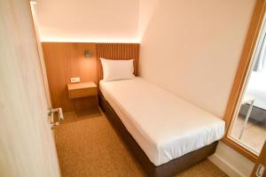 Postel nebo postele na pokoji v ubytování Sól by Privé - Boutique Hotel - Kepi i Rodonit