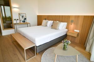 Postel nebo postele na pokoji v ubytování Sól by Privé - Boutique Hotel - Kepi i Rodonit