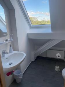 Phòng tắm tại Ferienwohnungen Sieversdorf +27 ảnh