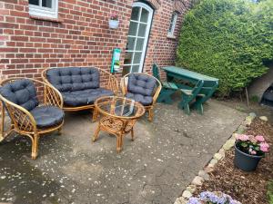 Khu vực ghế ngồi tại Ferienwohnungen Sieversdorf