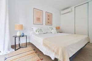 Posteľ alebo postele v izbe v ubytovaní Apartamento en primera linea de playa en la Malagueta