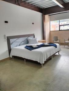 Hotel El Cordobes客房内的一张或多张床位