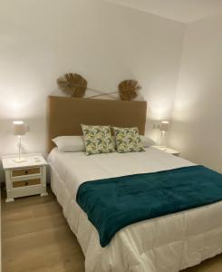 Postel nebo postele na pokoji v ubytování Habitaciones con baño sin cocina ni salón Sierra de las Villas