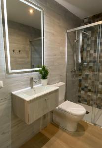 Koupelna v ubytování Habitaciones con baño sin cocina ni salón Sierra de las Villas