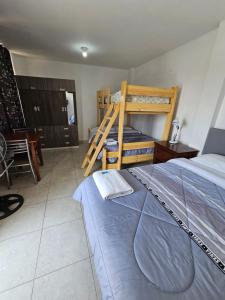 Postel nebo postele na pokoji v ubytování Hospedaje Las Parraz