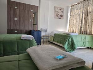 Postel nebo postele na pokoji v ubytování Hospedaje Las Parraz