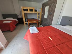 Postel nebo postele na pokoji v ubytování Hospedaje Las Parraz