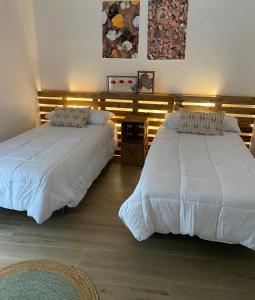 Postel nebo postele na pokoji v ubytování Apartamento Las Escocesas