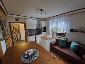 Kuchyň nebo kuchyňský kout v ubytování Apartment feelthenature