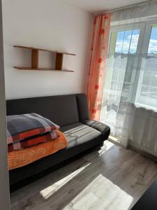 Uma área de estar em Pokoje i apartamenty Aga Centrum