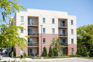 an exterior view of a building at Cute Condo TART Trail Bikes AC Downtown in Traverse City