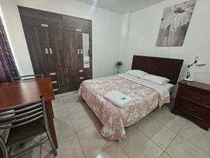 Postel nebo postele na pokoji v ubytování Hospedaje Las Parraz