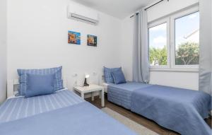 Postel nebo postele na pokoji v ubytování Apartman Family Čović