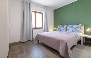 Postel nebo postele na pokoji v ubytování Apartman Family Čović
