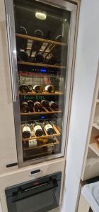a refrigerator filled with lots of donuts at Elite Pension in Štúrovo