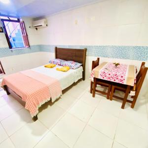 Giường trong phòng chung tại A Casa dos Mestres