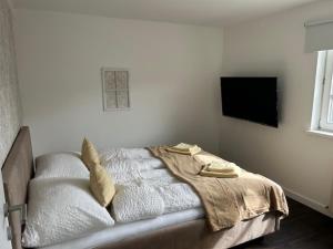 Postel nebo postele na pokoji v ubytování Traumwohnung mit eigenem Spa