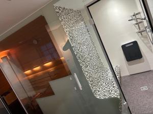 TV a/nebo společenská místnost v ubytování Traumwohnung mit eigenem Spa