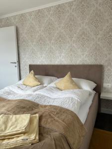 Postel nebo postele na pokoji v ubytování Traumwohnung mit eigenem Spa