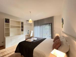 Postel nebo postele na pokoji v ubytování Casa Saramago by AnaLodges