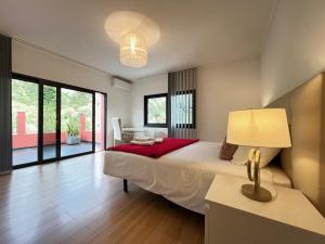 Postel nebo postele na pokoji v ubytování Casa Saramago by AnaLodges + 17 fotografií