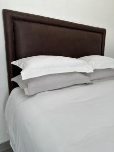 Voodi või voodid majutusasutuse Mikan AirBnB toas