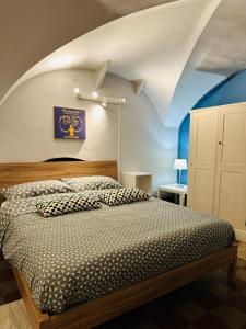 Voodi või voodid majutusasutuse Sicilian Vibes Flat in Palazzo Storico toas