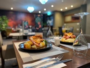 two plates of food on a table in a restaurant at The seahorse in Blythe +27 photos