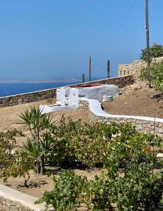 a skate park on a hill near the ocean at Flaskos Village Fanari in Mýkonos City