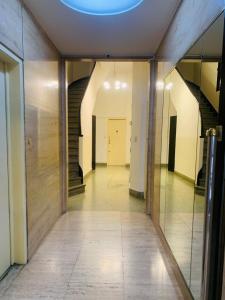 an empty hallway of a building with a blue ceiling at DTO 1AMB. RECOLETA in Buenos Aires