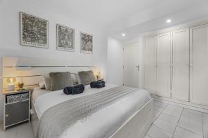 Ένα ή περισσότερα κρεβάτια σε δωμάτιο στο Holyhome casa laurane +13 φωτογραφίες