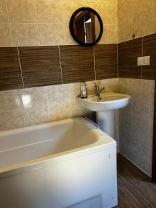 Et badeværelse på Útulný apartmán v centre Kežmarku