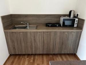 Køkken eller tekøkken på Útulný apartmán v centre Kežmarku + 5 billeder