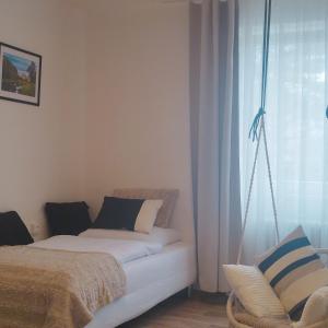 Postel nebo postele na pokoji v ubytování Morava apartmán 4 Uherské Hradiště Šafaříkova 855