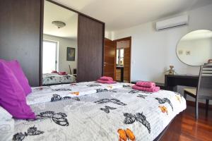 Krevet ili kreveti u jedinici u okviru objekta Panoramatic apartment