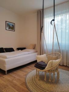 Postel nebo postele na pokoji v ubytování Morava apartmán 4 Uherské Hradiště Šafaříkova 855